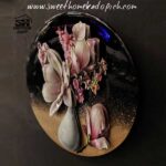 تصویر دیوارکوب بشقابی مدل گل و گلدان مشکی 1