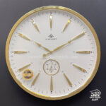 تصویر ساعت دیواری فلزی شوبرت طلایی صفحه سفید بدون شماره