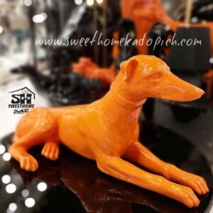 تصویر مجسمه سگ مدل پینچر نارنجی براق