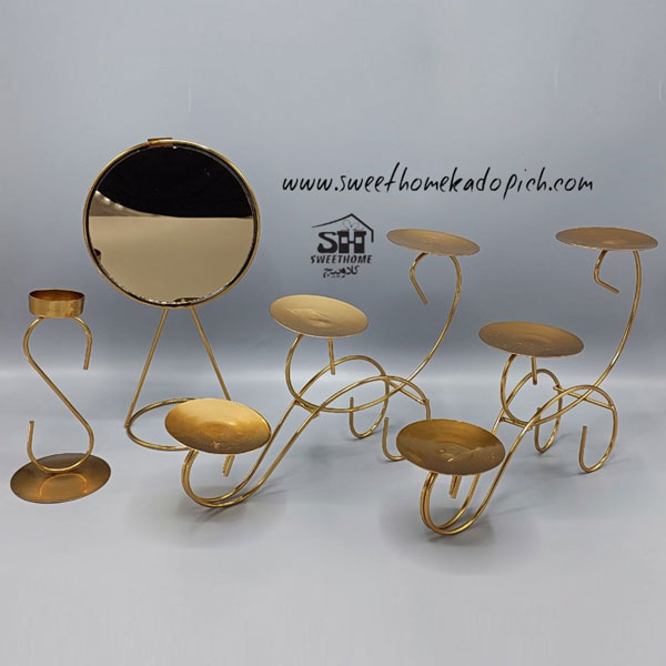 تصویر هفت سین فلزی مدل پیچک کالسکه ای طلایی