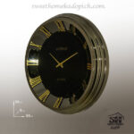 تصویر ساعت دیواری فلزی گرد آرتمیس تیتانیوم-طلایی