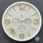 تصویر ساعت دیواری شوبرت سفید فلزی عدد دار