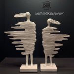 تصویر دکوری مجسمه دختر باد شیری